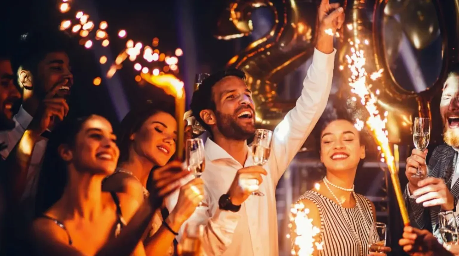 birthday party on a private yacht miami with group celebrating and decorations