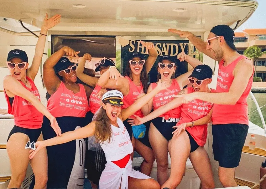 Bachelorette Yacht Party Miami — Crown Yachts bachelorette party on a miami yacht with decorations and group celebrating