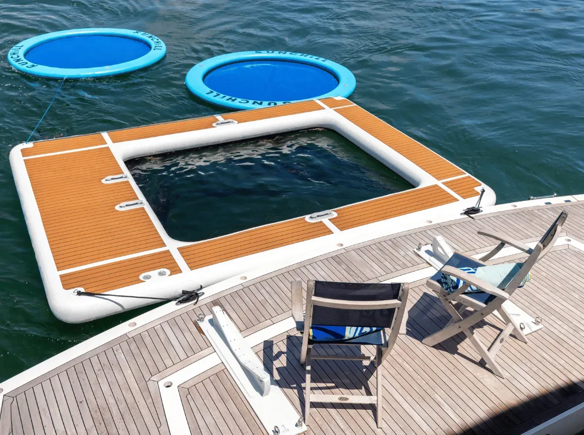 Bahamas Yacht Charter — Crown Yachts Miami luxury superyacht anchored in the bahamas with clear turquoise water and white sand