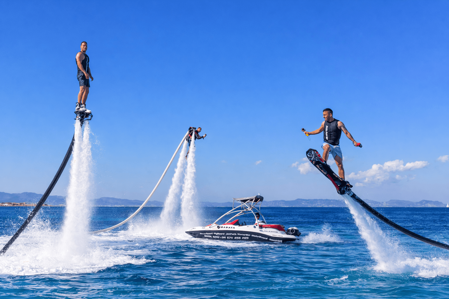 Jet ski watersports next to a luxury yacht in Miami
